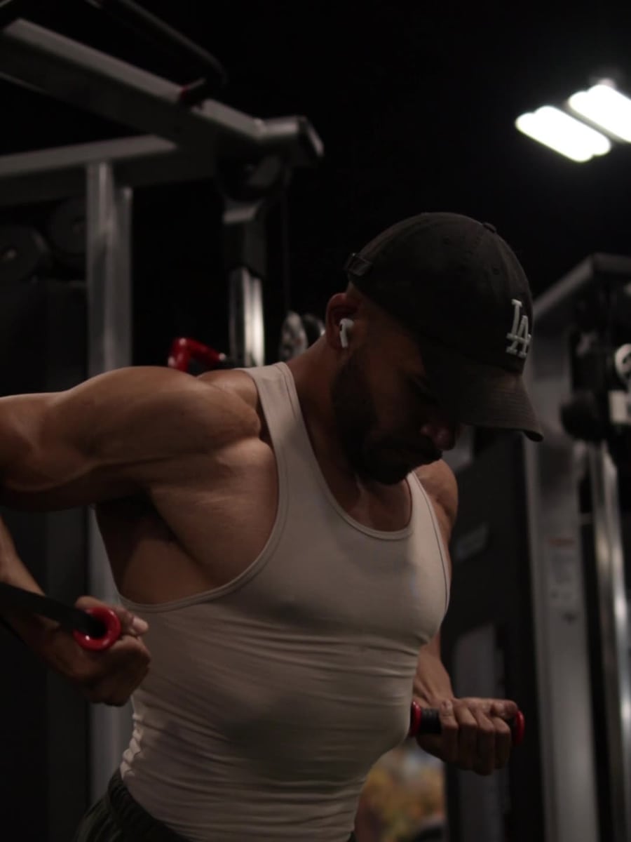 Athlete working through a cable exercise
